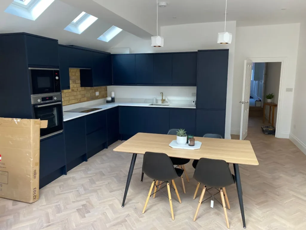 Open-plan kitchen-diner with rooflights in a rear extension – Tenfold Renovation