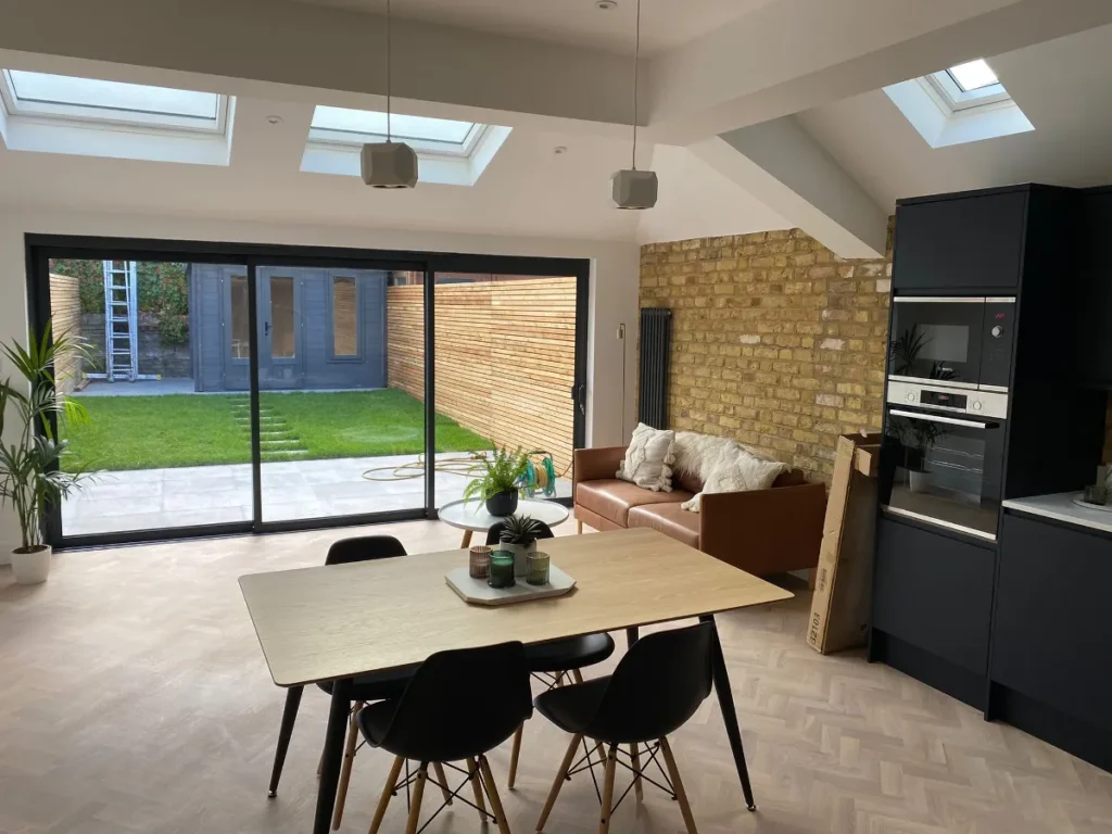 Rear extension with rooflights, sliding doors and open-plan kitchen-diner – Tenfold Renovation