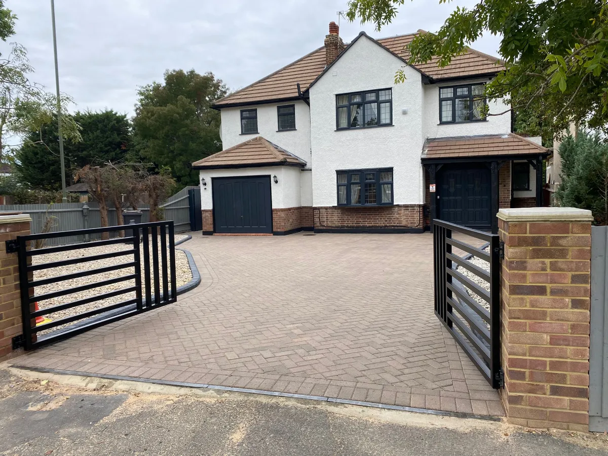 Detached house with new block-paved driveway and gates – Tenfold Renovation project