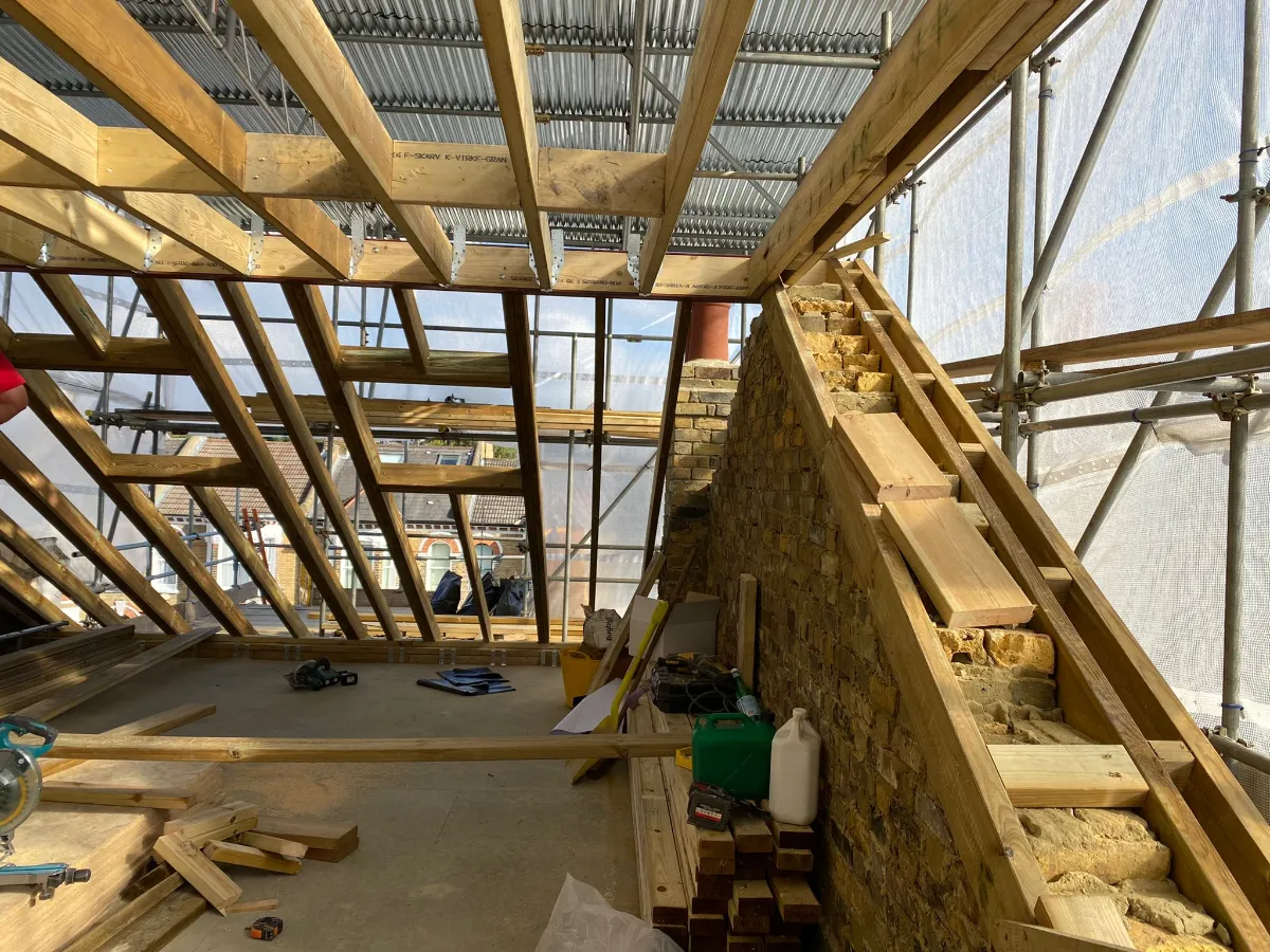 Timber roof framing during a Tenfold Renovation loft conversion in London